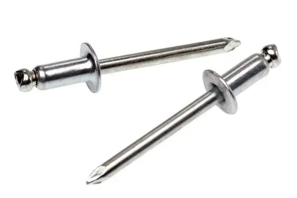 Two metal rivets on a white background