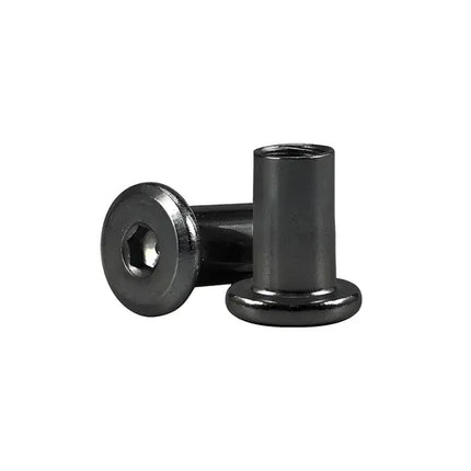 Two metal bushings on a white background