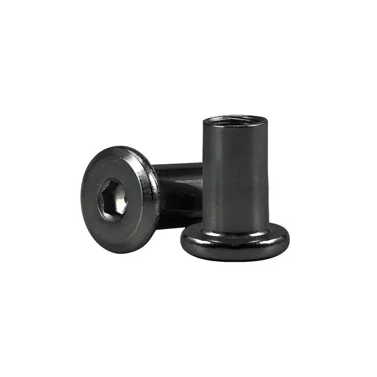 Two metal bushings on a white background