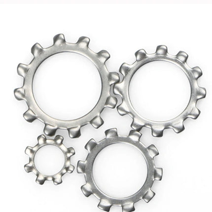 Four metallic gears on a white background
