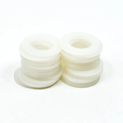 Stack of white circular filters on a white background