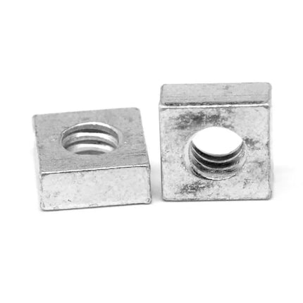 Two metal washers on a white background