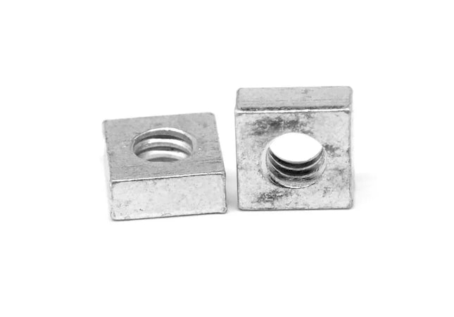 Two metal washers on a white background