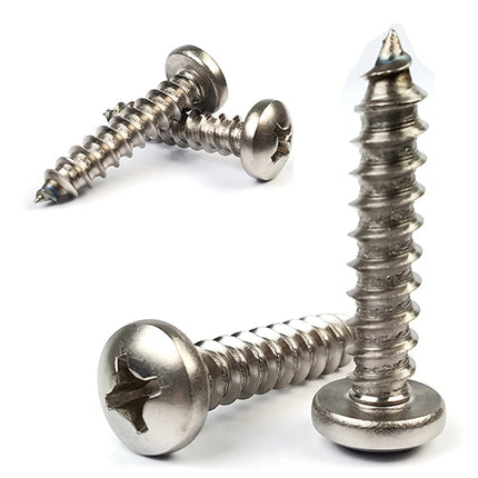 Three phillips pan head sheet metal screws on a white background