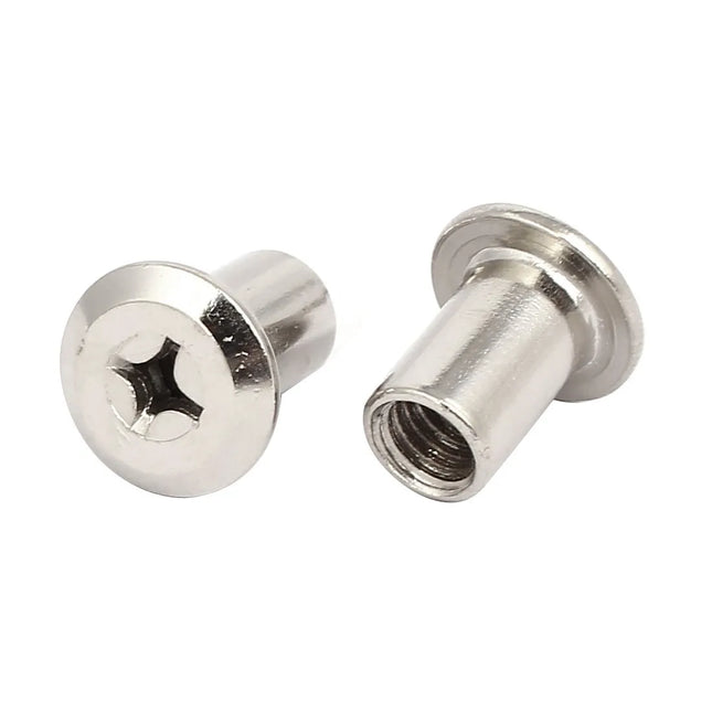 Two metal rivets on a white background