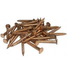 Bronze-colored nails on a white background