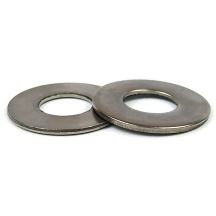 Two metal washers on a white background