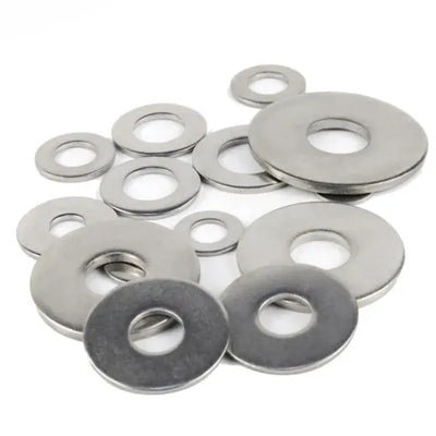 Set of metal washers on a white background